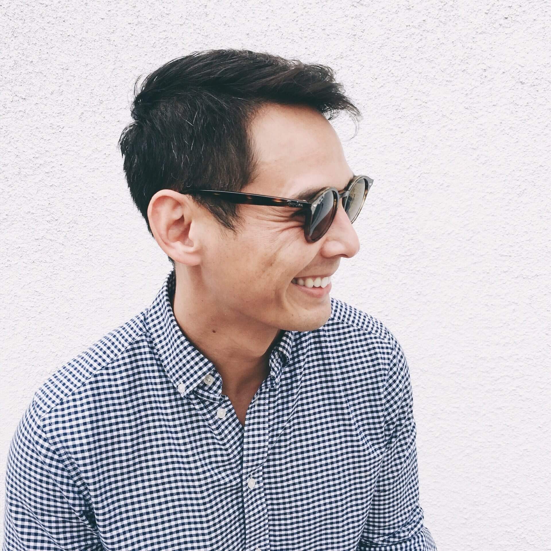 young-man-smiling-with-sunglasses